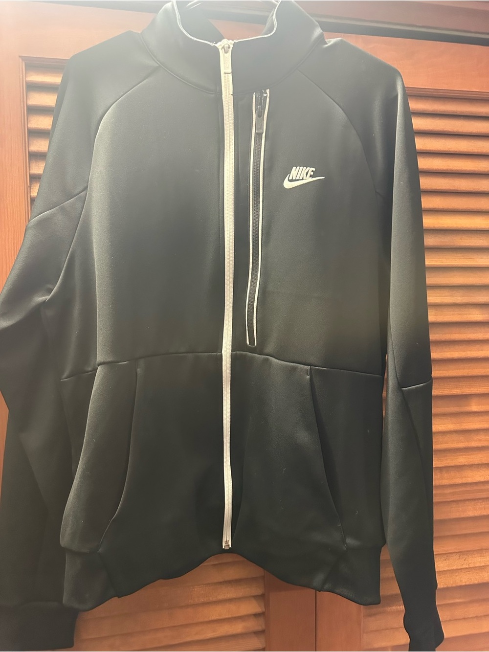 Nike Black Jacket with White Zipper Detail
